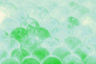 Japon desenli balık pulları. Soyut arkaplan, açık yeşil pastel tonlu