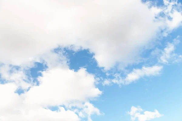 Sky with white clouds. Beautiful light sky background