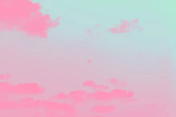Moon behind the bright pink clouds, pink toned