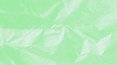 Buruşuk soluk yeşil ve açık gölgeli kağıt dokusu soyut 9 panoramik format arka planı