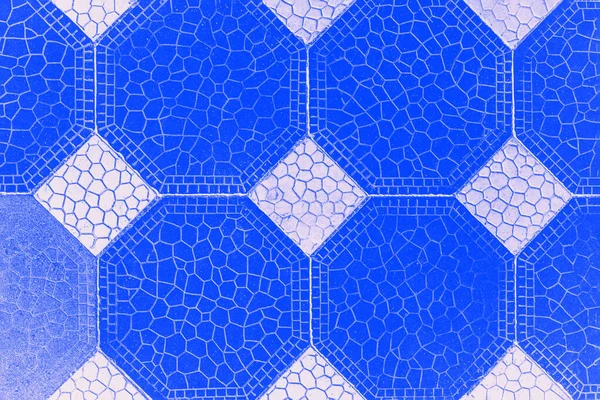 Blue and white tiles background with octagons and rhomb pattern. Geometric abstract background