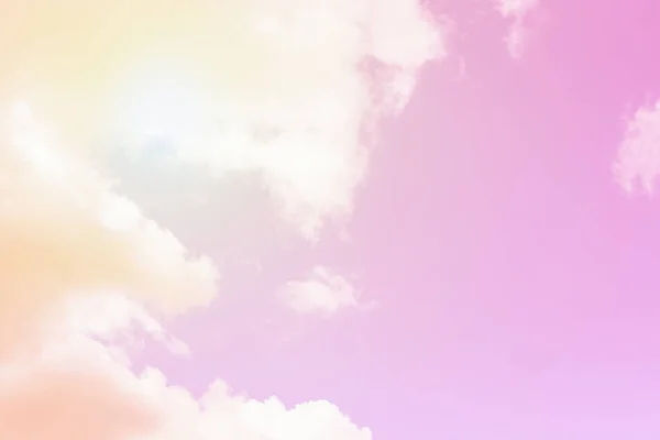 Sunny pink sky background. Beautiful sky with clouds. Copy space