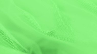 Açık yeşil arkaplanda küçük ağ kumaşı, 9 panoramik formatta 16