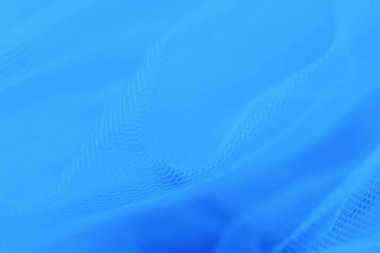 Açık mavi arkaplanda küçük ağ kumaşı