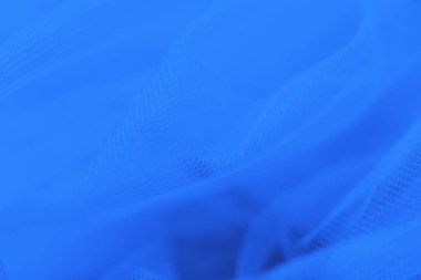 Mavi arkaplanda küçük mavi ağ kumaşı