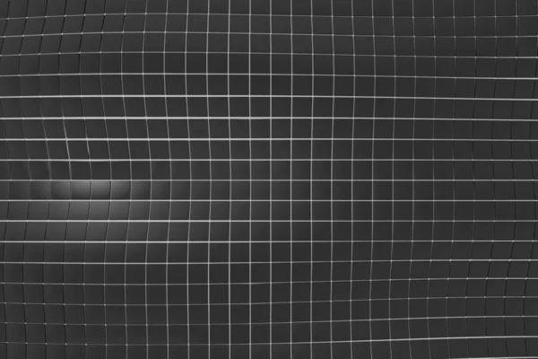 Superficie ondulada hecha de cubos negros con fondo brillante —  Fotos de Stock