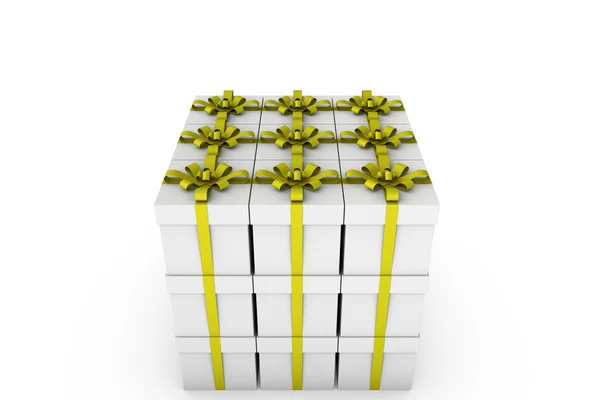 Białe pudełka z żółta wstążka łuk — Zdjęcie stockowe