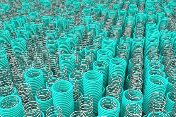 Металлические и пластиковые пружины и рулоны — стоковое фото