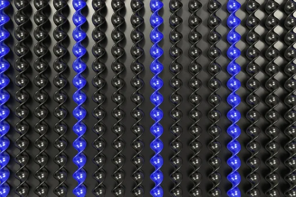 Palos espirales de plástico negro y azul sobre fondo negro —  Fotos de Stock