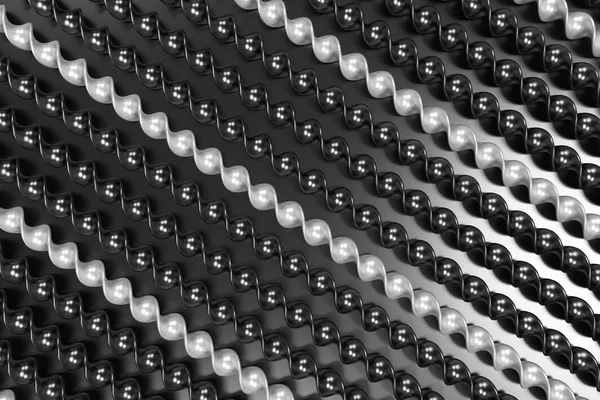 Palos espirales de plástico blanco y negro sobre fondo negro — Foto de Stock