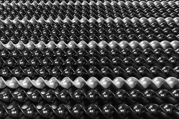 Чорно-білі пластикові спіральні палички на чорному тлі — стокове фото