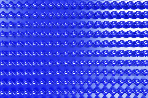 Сині пластикові спіральні палички на синьому фоні — стокове фото
