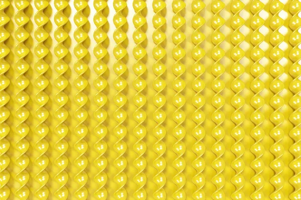 Giallo bastoni di plastica a spirale su sfondo giallo — Foto Stock