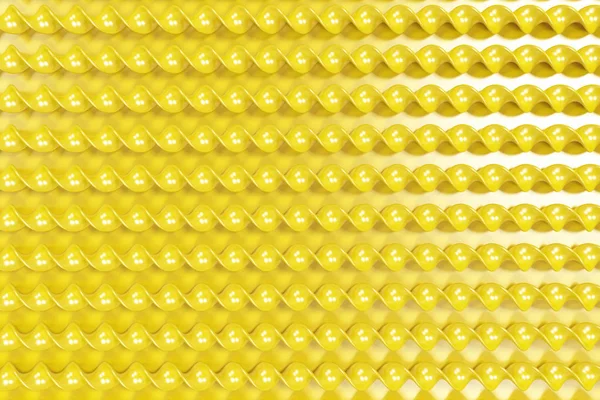 Palos espirales de plástico amarillo sobre fondo amarillo — Foto de Stock