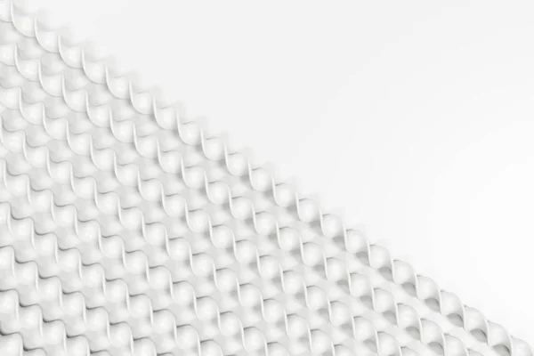 Weiße Plastikspiralen auf weißem Hintergrund — Stockfoto