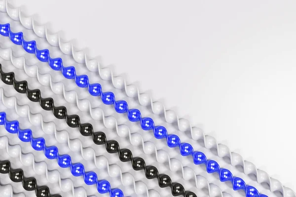 Preto, branco e azul plástico espiral paus no fundo branco — Fotografia de Stock