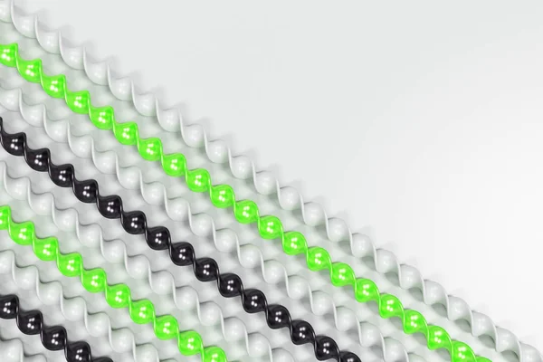 Preto, branco e verde plástico espiral paus no fundo branco — Fotografia de Stock