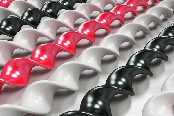 Bastões espirais de plástico preto, branco e vermelho no fundo branco — Fotografia de Stock