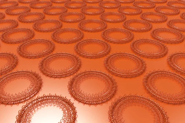 Modello di forme concentriche fatte di anelli e spirali su arancione — Foto Stock