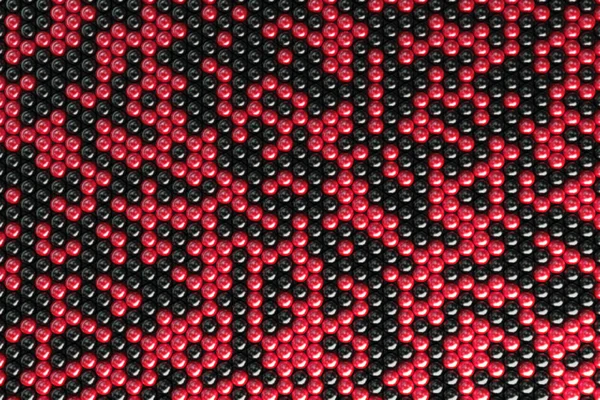 Patroon van zwarte en rode bollen — Stockfoto
