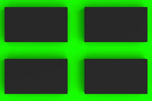 Черные пустые визитки макет на зеленом фоне — стоковое фото