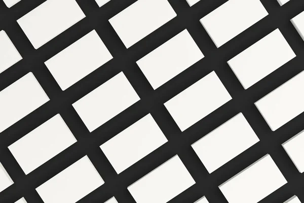 Weiße leere Visitenkarten-Attrappe auf schwarzem Hintergrund — Stockfoto