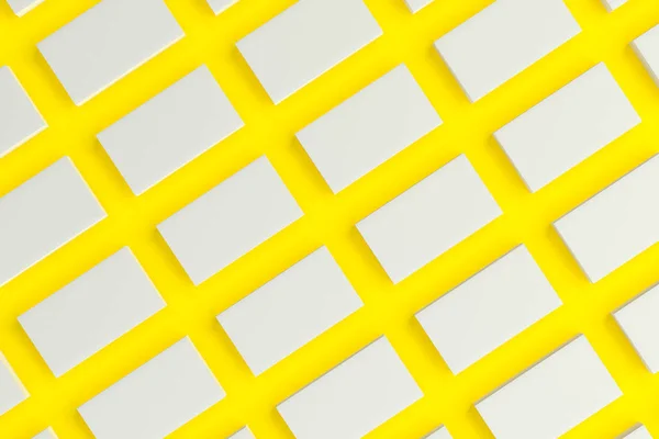 黄色の背景に白の空白の名刺モックアップ — ストック写真