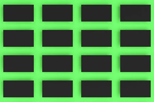 在绿色背景上的黑色空白名片模拟 — 图库照片