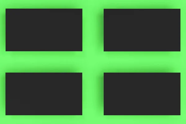 在绿色背景上的黑色空白名片模拟 — 图库照片