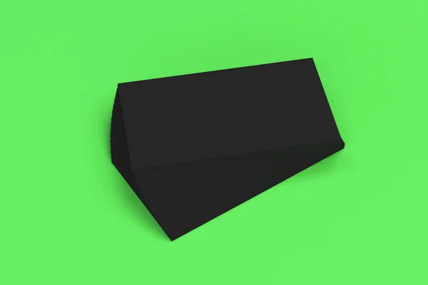 Maketa černá prázdné vizitky na zeleném pozadí — Stock fotografie