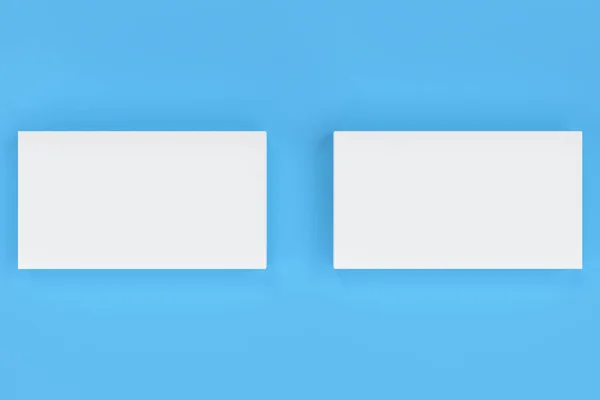 Branco branco branco cartões de visita mock-up no fundo azul — Fotografia de Stock