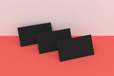 Beyaz ve kırmızı zemin üzerine siyah boş kartvizit mock-up