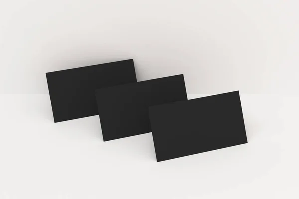 Black blank business cards mock-up on white background — Stock Photo, Image