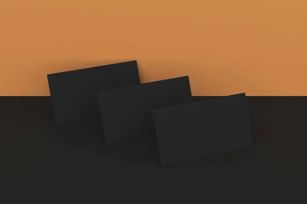 Preto branco cartões de visita mock-up em preto e laranja backgroun — Fotografia de Stock