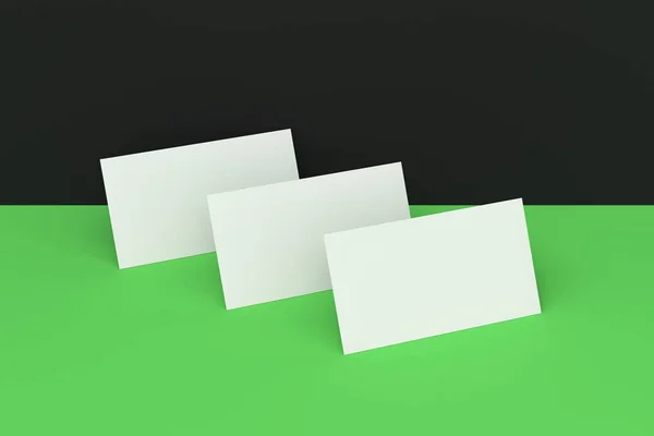 White blank business cards mock-up on black and green background — Stock Photo, Image