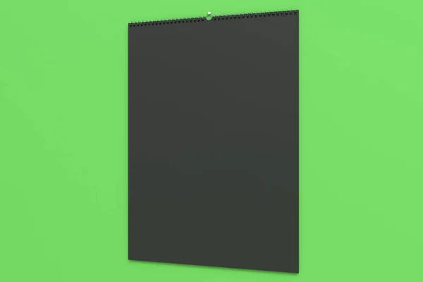 Black wall calendar mock-up on green background — Stock Photo, Image