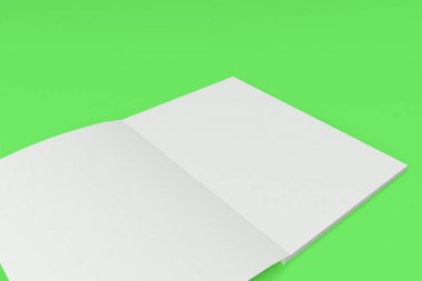 Boş beyaz açık broşür mock-up yeşil zemin üzerine