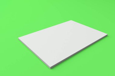 Boş beyaz kapalı broşür mock-up yeşil zemin üzerine