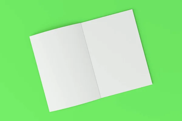 Üres fehér nyitott brosúra modell zöld háttér — Stock Fotó