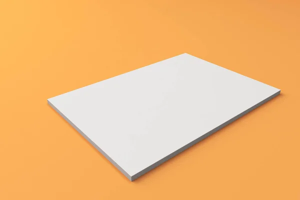 Leere weiße geschlossene Broschüre-Attrappe auf orangefarbenem Hintergrund — Stockfoto