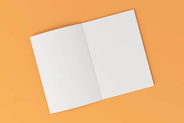 Boş beyaz açık broşür mock-up turuncu zemin üzerine — Stok fotoğraf