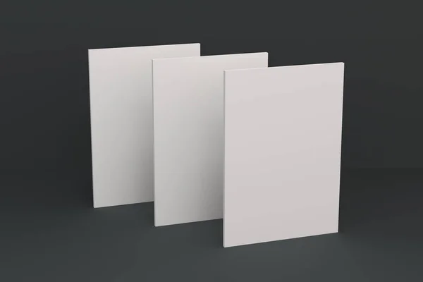 Три порожніх білих закритих макет брошури на чорному тлі — стокове фото