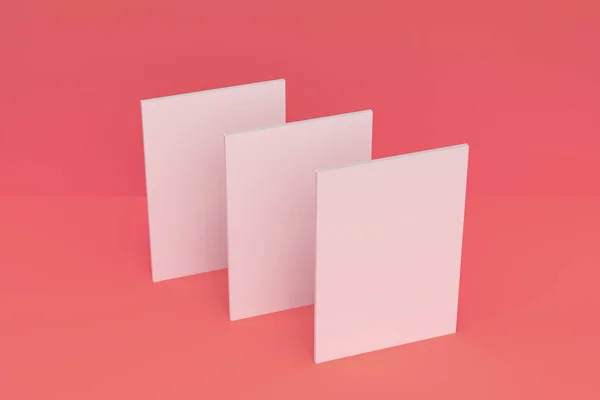Három üres fehér zárt brosúra modell piros háttér — Stock Fotó