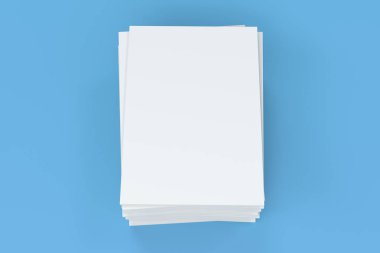 Boş beyaz kapalı broşür mock-up mavi zemin üzerine yığını