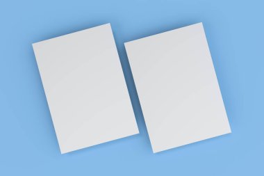 Boş beyaz el ilanı mockup mavi zemin üzerine