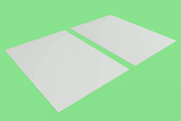 Makieta dwie puste ulotki biały na zielonym tle — Zdjęcie stockowe
