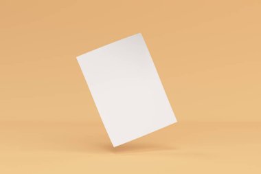 Boş beyaz bükümlü el ilanı mockup turuncu zemin üzerine