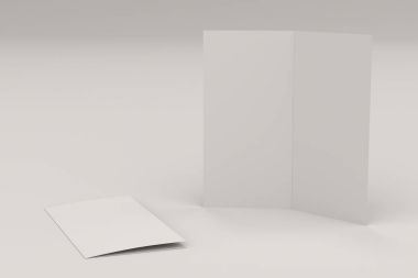 Boş beyaz iki kat broşürü mockup beyaz arka plan üzerinde