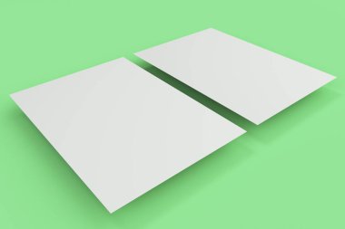 Boş beyaz el ilanı mockup yeşil zemin üzerine