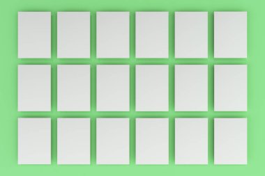 Boş beyaz el ilanı mockup yeşil zemin üzerine